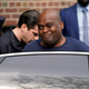 Law enforcement officials lead subway shooting suspect Frank R. James, 62, away from a police station and into a vehicle in New York on April 13, 2022.